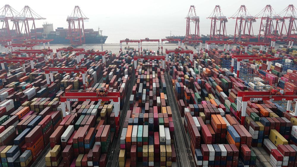 China tops world in port cargo, container throughput - CGTN