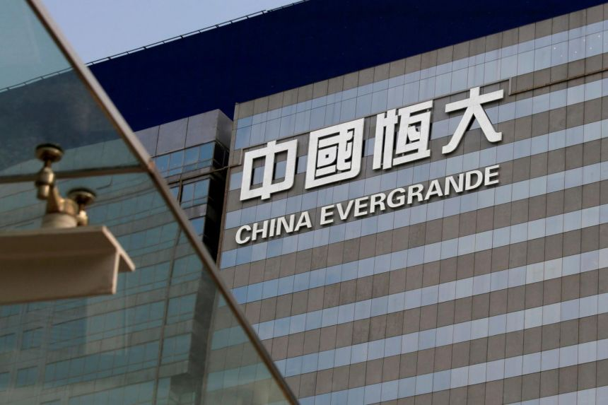 China Evergrande bonds halted; world's most indebted developer hit by fears of cash crunch, Companies & Markets News & Top Stories - The Straits Times