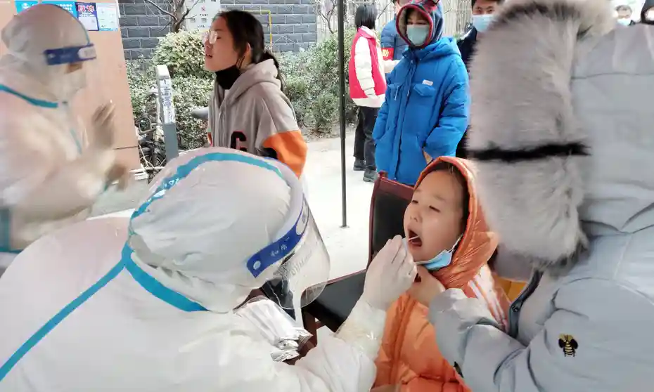Covid global report: Omicron alert in southern Chinese city bordering Macau | Coronavirus | The Guardian