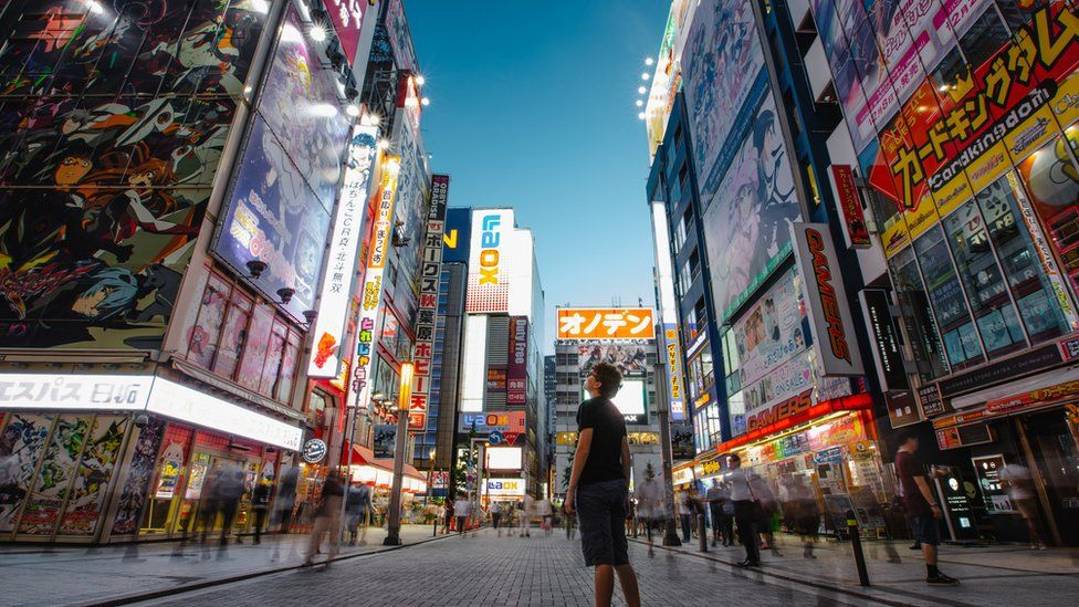 Japan could lift cap on foreign tourists to lift economy - BBC News