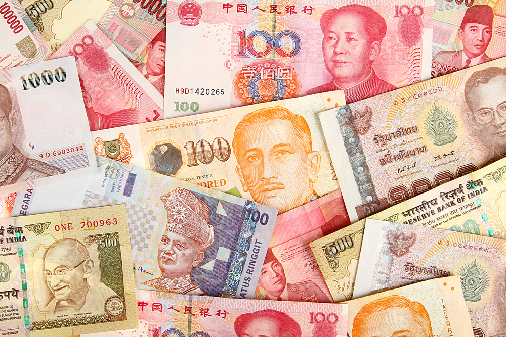 Tiền tệ châu Á đồng loạt giảm giá do tác động từ dịch COVID-19 | Tài chính | Vietnam+ (VietnamPlus)