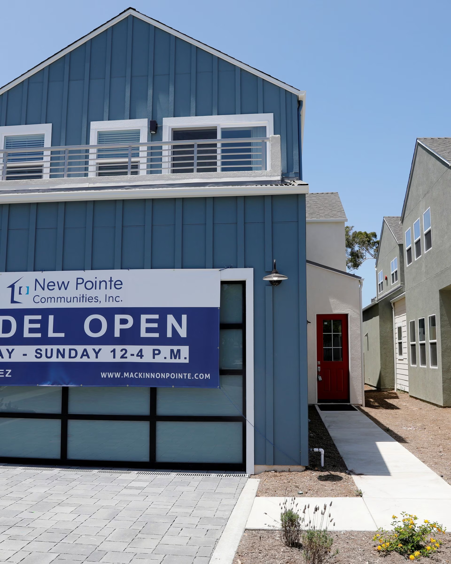 US single-family housing starts to drop; building permits hit 12-month high  | Reuters